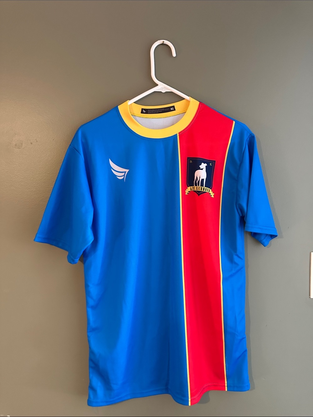 Ted Lasso Blue and Red Athletic Jersey with Yellow Trim